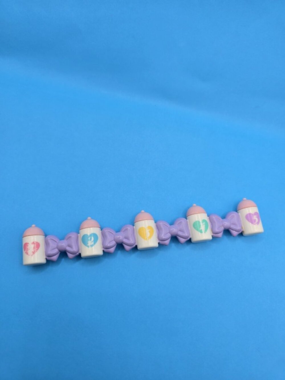 1989 Vintage Tyco The Quints Special For 5 Baby Bottles Connected w/Purple Bows